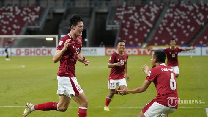 Pemain Timnas Indonesia Elkan Baggott melakukan selebrasi usai mencetak gol ke gawang Malaysia pada pertandingan sepak bola Grup B Piala AFF Suzuki 2020 antara Malaysia dan Indonesia di Stadion Nasional di Singapura, Minggu (19/12/2021). Indonesia berhasil menekuk Malaysia dengan skor 4-1 dan lolos ke semifinal. TRIBUNNEWS/PSSI